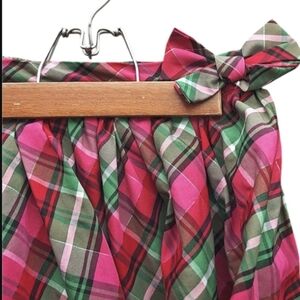 :6: Pink and Green Plaid Osh Kosh Skirt with a Bow.